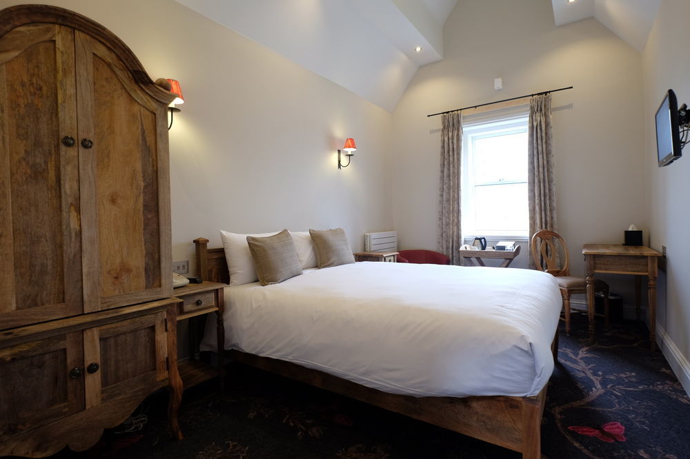 Bed and Breakfast Cotswold Grange Cheltenham Exterior foto A room at the hotel